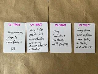 New UX Trait cards described in the text above